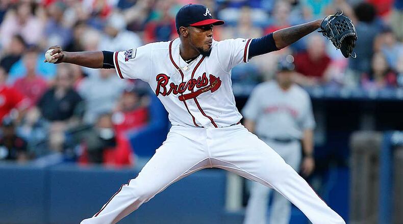 Braves starting pitcher Julio Teheran delivers in the first inning of a baseball game against the Philadelphia Phillies Saturday, July 30, 2016, in Atlanta. (AP Photo/John Bazemore)