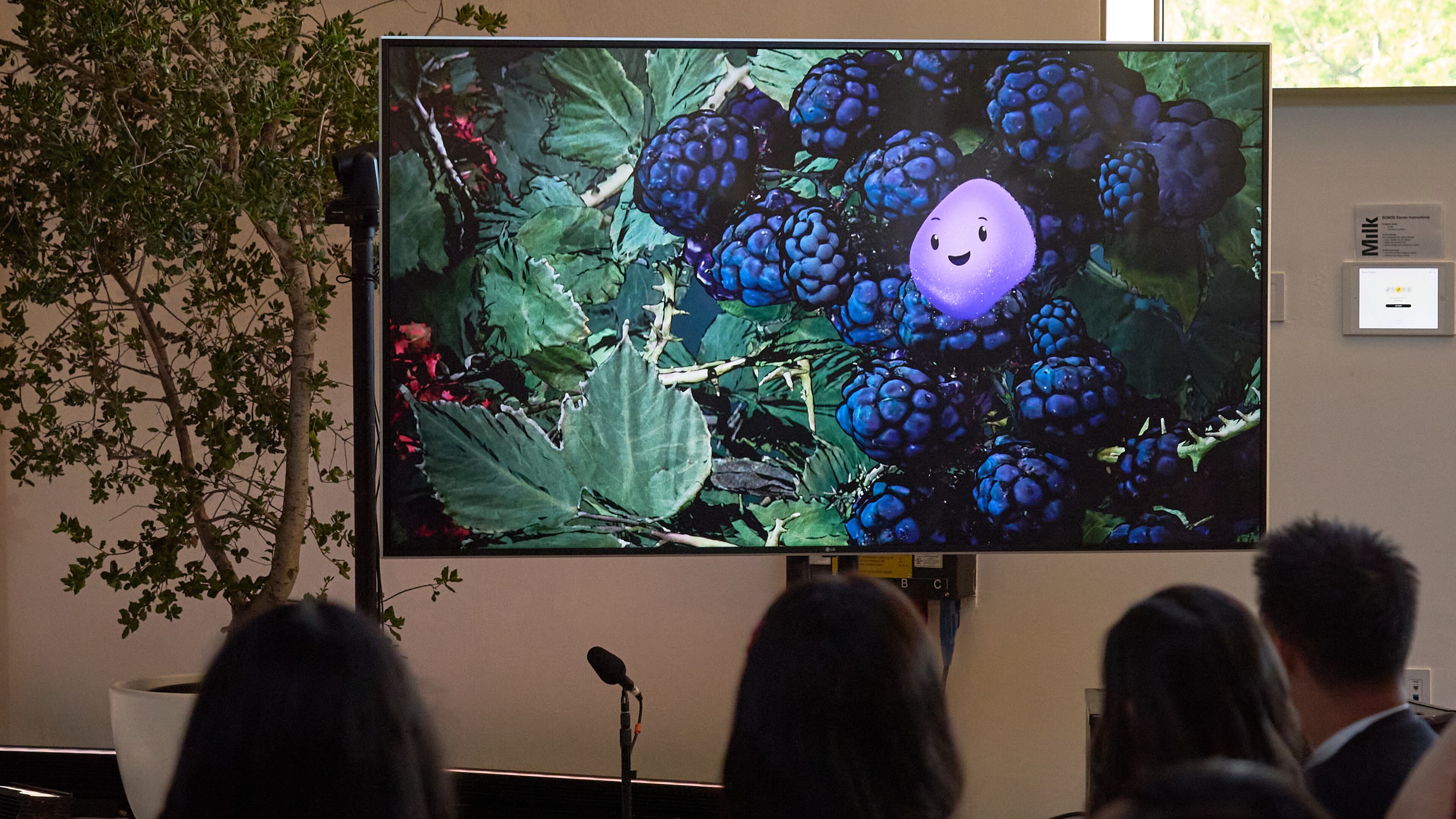 A video animation shows a Copilot Appearance avatar called Mico, floating around an abstract environment during a presentation at Microsoft's Fall 2025 Copilot Sessions event on Wednesday, Oct. 22, 2025, in Los Angeles. (AP Photo/Damian Dovarganes)