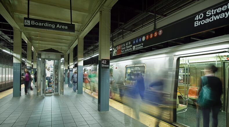 Time-lapse image of a Times Square subway platform in New York. (Stock photo)