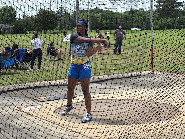 Sierra Thorton of Chamblee warms up for the Class 5A discus title May 9, 2025. She won a gold medal in Rome. (Stan Awtrey/for the AJC)
