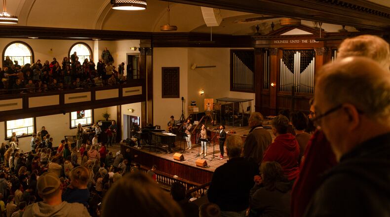 Students leading worship inside Hughes Chapel on the campus of Asbury University in Wilmore, Ky., on Feb. 17, 2023. Over two weeks, more than 50,000 people descended on a small campus chapel to experience the nation’s first major spiritual revival in decades — one driven by Gen Z. (Jesse Barber/The New York Times)