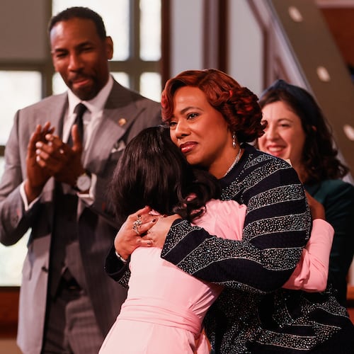 FILE - Bernice A. King, facing forward, hugs Siara White after her tribute to Coretta Scott King during the Martin Luther King Jr. Beloved Community Commemorative Service at Ebenezer Baptist Church in Atlanta, Jan. 19, 2026. (Abbey Cutrer/Atlanta Journal-Constitution via AP, File)