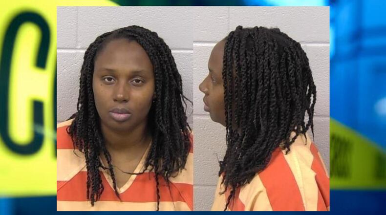 Darlene Nicole Brister, 40, was charged with two counts of malice murder and is being held without bond in a Paulding County jail. Her charges stem from a house fire Friday night in which three children died and another was hospitalized with burn wounds, Paulding fire officials confirmed.