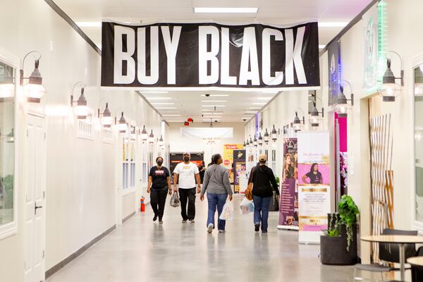 Customers walked among the storefronts at the New Black Wall Street Market, on Saturday, October 15, 2022. (Christina Mattacotta for the AJC)