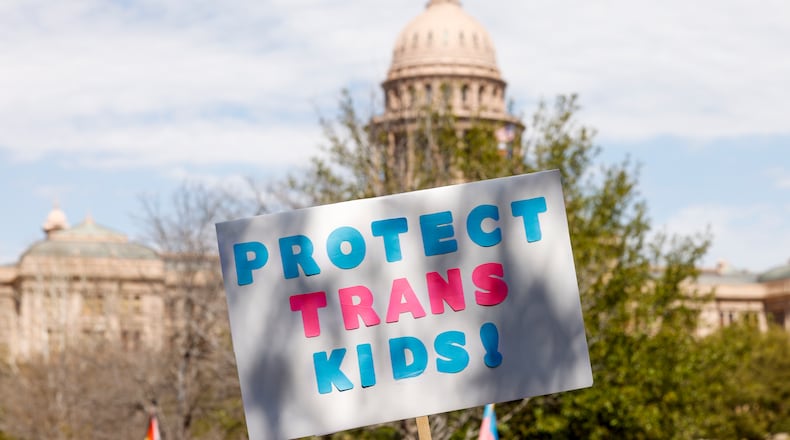 A national movement to reduce the medical options open trans kids such as pubery blockers gained ground in Georgia this week after a Senate committee added language to an unrelated health bill that would restrict the treatments minors can receive to aid in gender transition. (Elias Valverde II/The Dallas Morning News/TNS)