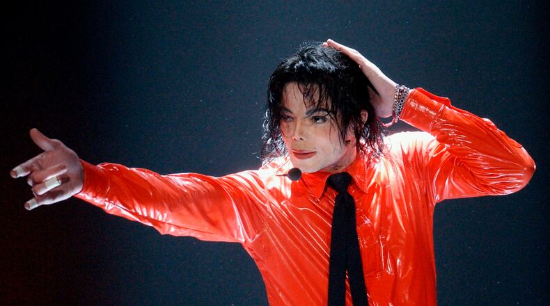 FILE - Michael Jackson performs during the taping of the American Bandstand's 50th anniversary show in Pasadena, Calif., on on April 20, 2002. (AP Photo/Kevork Djansezian, File)