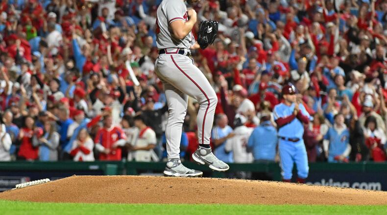 Braves starting pitcher Spencer Strider brushes off the pitching mound after giving up a solo home run to Philadelphia Phillies’ Trea Turner during the fifth inning of NLDS Game 4 at Citizens Bank Park in Philadelphia on Thursday, Oct. 12, 2023. (Hyosub Shin / Hyosub.Shin@ajc.com)