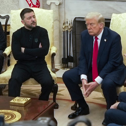 FILE - Vice President JD Vance, right, speaks with Ukrainian President Volodymyr Zelenskyy, left, as President Donald Trump listens in the Oval Office at the White House, Feb. 28, 2025, in Washington. (AP Photo/ Mystyslav Chernov, File)
