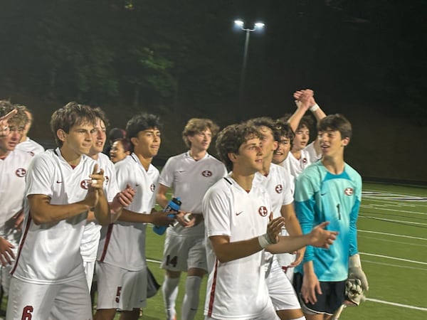 Johns Creek celebrates its victory over River Ridge, which was trying to win its third straight championship. (Stan Awtrey for the AJC)