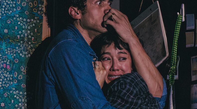 Travis A. Knight, left, and Cher Álvarez appear during a performance of the play "Paranormal Activity" in Boston on July 10, 2026. (Matthew Murphy via AP)