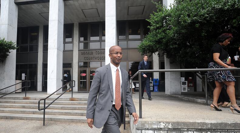 DeKalb County District Attorney Robert James leaves the the courthouse after DeKalb County CEO Burrell Ellis was found guilty on four counts in his retrial July 1, 2015. The Georgia Supreme Court overturned Ellis’ conviction Nov. 30, 2016. KENT D. JOHNSON /KDJOHNSON@AJC.COM