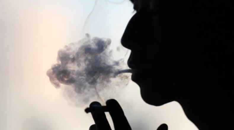 Proposal would ban smoking in cars with children. File Photo