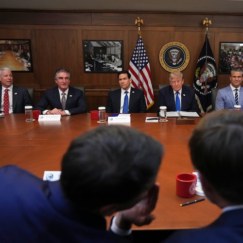 President Donald Trump, seated center, joined by Energy Secretary Chris Wright, from left, Interior Secretary Doug Burgum, Secretary of State Marco Rubio, Defense Secretary Pete Hegseth, acting Labor Secretary Keith Sonderling, and Housing and Urban Development Secretary Scott Turner, attends a cabinet meeting, Friday, July 31, 2026, at Camp David, the presidential retreat, near Thurmont, Md., Friday, July 31, 2026. (AP Photo/Jacquelyn Martin)