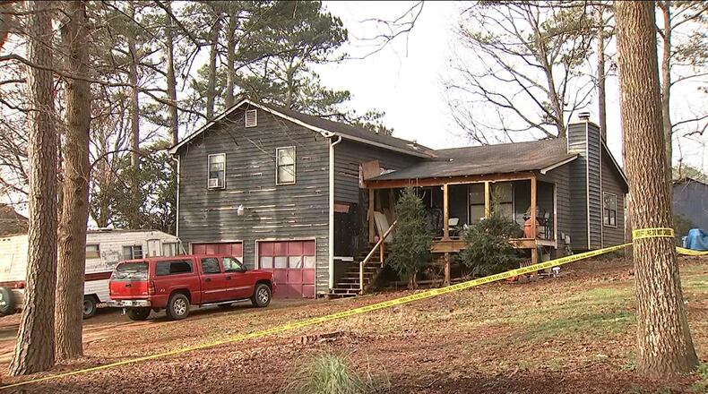 Paulding County investigators are working to piece together what happened at a Mill Road home before a man was shot dead and another was stabbed and critically injured early Sunday morning.