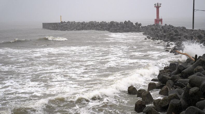 A coastline is hit by high waves as a typhoon approaches Futtsu city, Chiba prefecture near Tokyo, Saturday, June 27, 2026. (Kyodo News via AP)