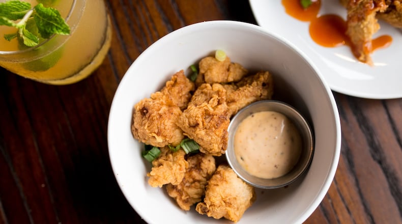The Shawk Bites — tender shark meat seasoned, lightly battered and fried golden — at Virgil’s Gullah Kitchen and Bar are served with a remoulade for dipping. CONTRIBUTED BY MIA YAKEL