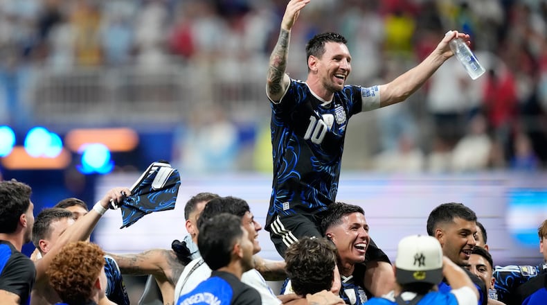Argentina's Lionel Messi celebrates with his teammates at the end of the World Cup semifinal soccer match between England and Argentina in Atlanta, Wednesday, July 15, 2026. (Rebecca Blackwell/AP)