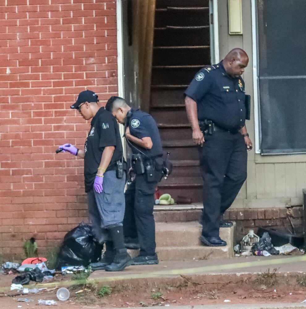 July 18, 2022 Atlanta: Five people were shot early Monday, July 18, 2022 when gunfire erupted at a large gathering at a condemned apartment complex in southeast Atlanta, police said. The shootings took Atlanta police officers to the Forest Cove Apartments in the Thomasville Heights neighborhood shortly before 2 a.m. According to deputy police Chief Charles Hampton Jr., the victims range in age from 13 to 42. One was taken to a hospital in a private vehicle before officers arrived, and none was interviewed by investigators before undergoing treatment, Hampton said. At least one, an unnamed teenager, remains in Òvery critical condition,Ó he said. ÒOfficers are on scene trying to comb (through) exactly what happened,Ó Hampton said Monday from the complex. ÒWe know there was quite a large gathering when some individuals came to this location and started shooting. Right now, we are asking anyone who was out here to call Crime Stoppers, where they can remain anonymous, to let us know exactly what happened.Ó Police took in several people for questioning, but no one was being detained as a suspect early Monday, he said. The deputy chief was hopeful that interviews with the victims would help them develop a suspect description. Early in the investigation, detectives are not sure if they are looking for multiple gunmen, or if the gunfire came from a vehicle or someone on foot. More than one victim resided at the complex, according to Hampton. Last month, the city of Atlanta began relocating families from Forest Cove ahead of demolition Sept. 21, but officials said last week the process is behind schedule. The blighted complex has been the site of at least 231 code violations and more than 650 police calls for violent crime, according to court documents filed by the city last year. Fulton County District Attorney Fani Willis has identified Forest Cove as one of the worst apartment complexes for gang activity and vowed to crack down on offenders. It was listed among 43 properties with the highest number of crimes and housing code violations for poor living conditions, as released by Atlanta City Solicitor Raines Carter. Since 2009, Atlanta police have investigated 19 homicides there. MondayÕs multiple shootings remain under investigation. Tipsters can remain anonymous, and be eligible for rewards of up to $2,000, by contacting Crime Stoppers Atlanta at 404-577-8477, texting information to 274637 or visiting  (John Spink / John.Spink@ajc.com)


