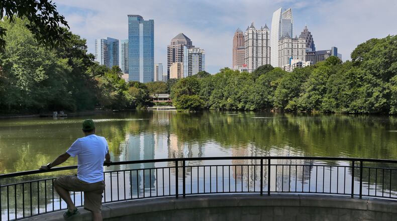 Charlie Saye took in the great view of midtown at Piedmont Park's Lake Clara Meer Friday.