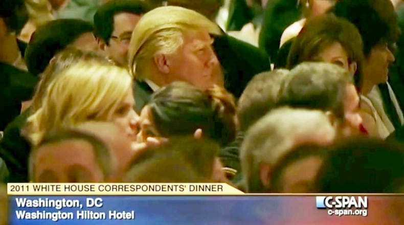 Donald Trump stares at the stage as comedian Seth Meyers makes fun of him at the 2011 White House Correspondents' Association dinner. MUST CREDIT: Image from C-SPAN