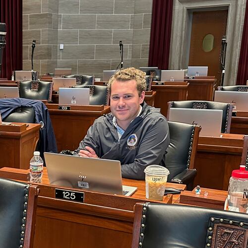 FILE - Missouri state Rep. Jeremy Dean, D-Springfield, glances up from his computer in the Missouri House chamber during a special legislation session, Sept. 8, 2025 in Jefferson City, Mo. (AP Photo/David A. Lieb, File)