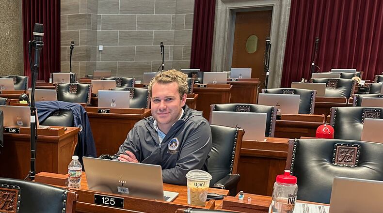 FILE - Missouri state Rep. Jeremy Dean, D-Springfield, glances up from his computer in the Missouri House chamber during a special legislation session, Sept. 8, 2025 in Jefferson City, Mo. (AP Photo/David A. Lieb, File)