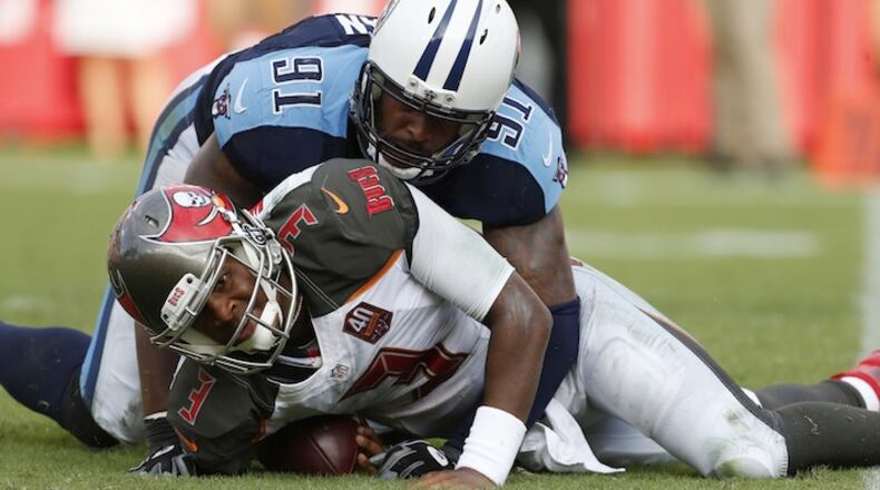 Tampa Bay Buccaneers quarterback Jameis Winston (3 is sacked by Tennessee Titans outside linebacker Derrick Morgan (91) is about to sack him during the second half of an NFL football game, Sunday, Sept. 13, 2015, in Tampa, Fla. The Titans defeated the Bucs 42-14.(AP Photo/Brian Blanco)