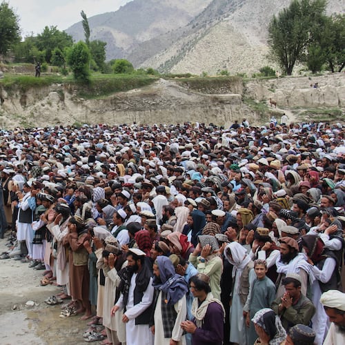 Mourners pray during a funeral for victims, including children, of airstrikes that Taliban officials said were carried out by Pakistan, in Mana, a village in Afghanistan's Khost province, Wednesday, June 10, 2026. (AP Photo/Saifullah Zahir)