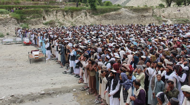 Mourners pray during a funeral for victims, including children, of airstrikes that Taliban officials said were carried out by Pakistan, in Mana, a village in Afghanistan's Khost province, Wednesday, June 10, 2026. (AP Photo/Saifullah Zahir)