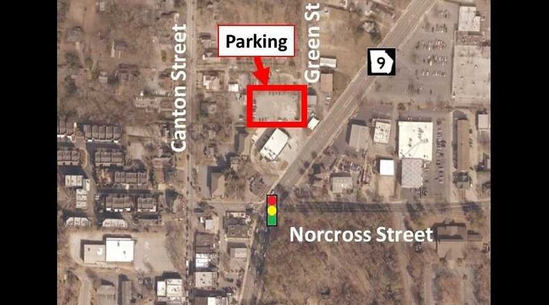 Crews installed new curbs, removed old asphalt and filled potholes at the Green Street lot, which has about 70 spaces.