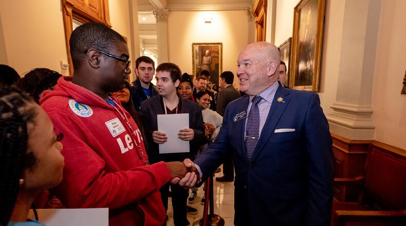 State Sen. Mike Dugan (R-Carrollton) talks with advocates for the developmental disability community during a previous advocacy day.