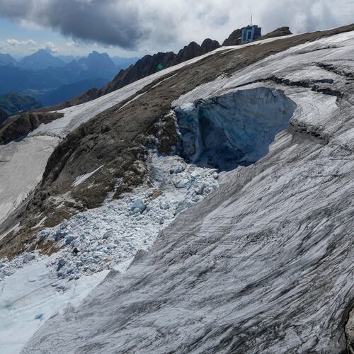 FILE - A view taken from a rescue helicopter of the Punta Rocca glacier near Canazei, in the Italian Alps in northern Italy, Tuesday, July 5, 2022. (AP Photo/Luca Bruno, File)