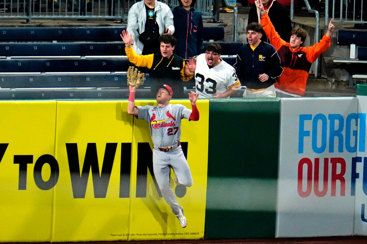 St. Louis Cardinals left fielder Nathan Church (27) leaps to make the catch on a fly ball by Pittsburgh Pirates' Nick Gonzales to end the baseball game in Pittsburgh, Wednesday, April 29, 2026. (AP Photo/Gene J. Puskar)