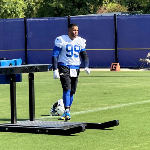 Aaron Donald takes the field for practice at the Los Angeles Rams' training complex in Los Angeles, Sunday, Aug. 30, 2026. (AP Photo/Greg Beacham)