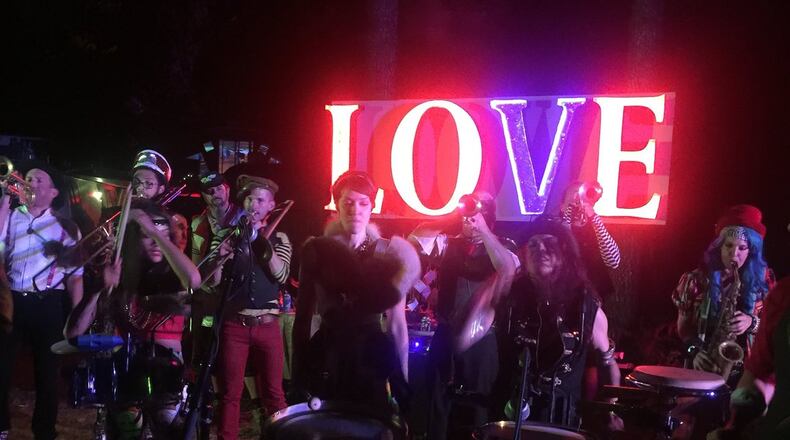 Janet Wells of Sandy Springs said she takes photo as she take walks and visits friends. She said she took this one while watching March Forth, a marching band in Portland Oregon. “Its all about Love,” she wrote.
