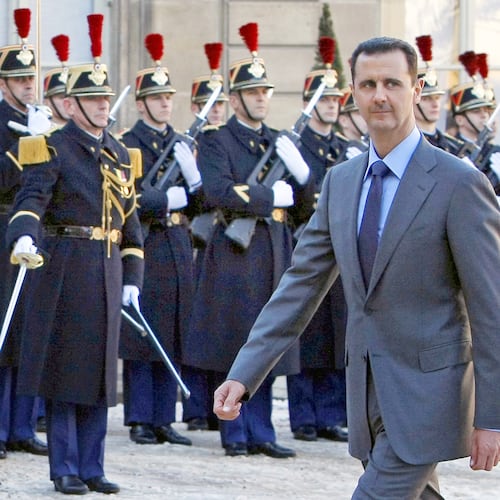 FILE - In this Dec. 9, 2010 file photo, Syria President Bashar al-Assad arrives at the Elysee Palace in Paris for his meeting with French President Nicolas Sarkozy. (AP Photo/Remy de la Mauviniere, File)