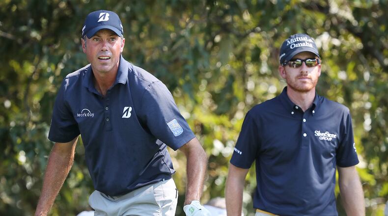 Former Georgia Tech golfers Matt Kuchar (left) and Roberto Castro watch Kuchar’s shot on the third tee during the final round of the Tour Championship at East Lake Golf Club last September. Kuchar and Castro are among eight former Georgia Tech and Georgia golfers in this week’s Masters. (Curtis Compton/ccompton@ajc.com)