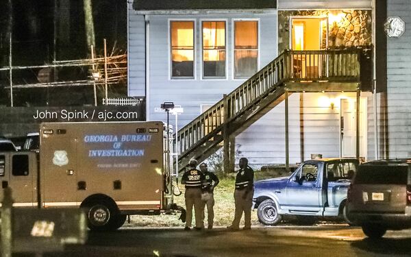 GBI agents responded to the Ellison Court home overnight after a Cobb County officer was shot in the arm, and a suspect was shot in the torso.