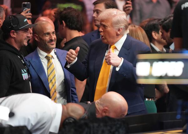 President Donald Trump gives a thumbs up as he attends a mixed martial arts fight at UFC 314, Saturday, April 12, 2025, in Miami. (AP Photo/Lynne Sladky)