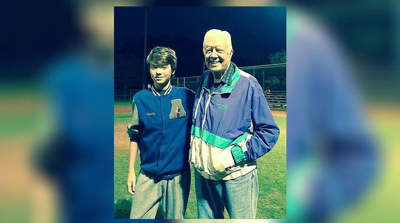 Former President Jimmy Carter has never removed himself from the public. Earlier this year, he paused to say hello to Reuben Davis (pictured) while watching a great-grandson play baseball in Decatur. JACOB SEUVER