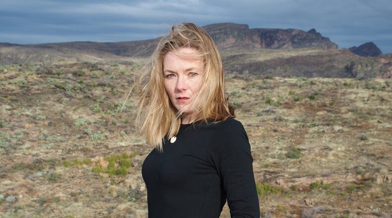 Poet Julie E. Bloemeke's book "Slide to Unlock" has been selected a 2021 Book All Georgians Should Read.
Contributed by Sibling Rivalry Press