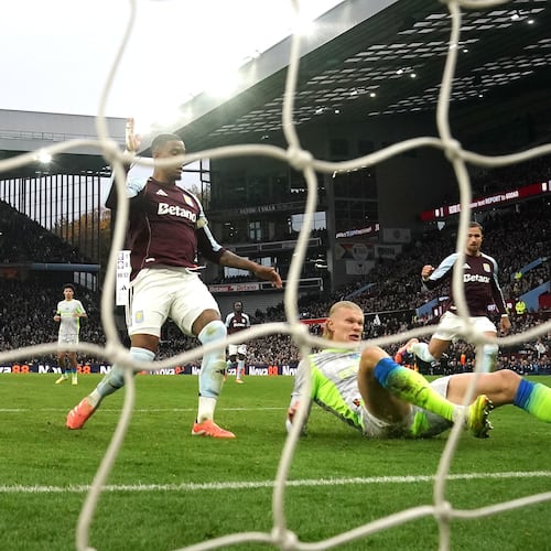 Manchester City's Erling Haaland scores a goal before being ruled out for offside via VAR during the English Premier League match between Aston Villa and Manchester City, in Birmingham, England, Sunday Oct. 26, 2025. (Nick Potts/PA via AP)