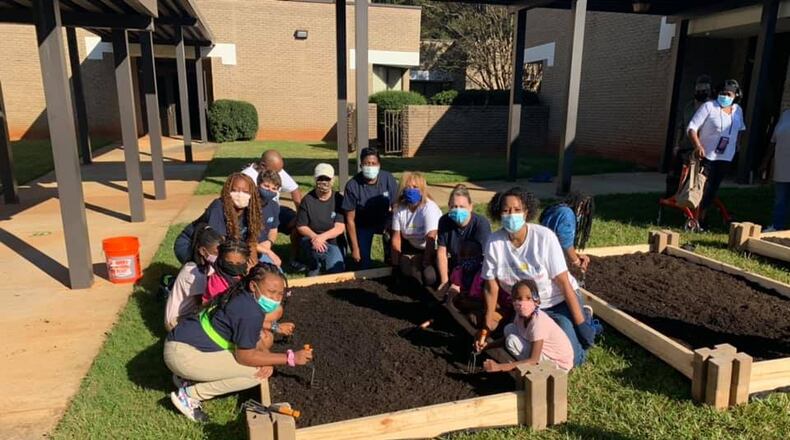 Students participate in their school gardening program sponsored by Live Healthy & Thrive Foundation. Courtesy of Live Healthy & Thrive Foundation