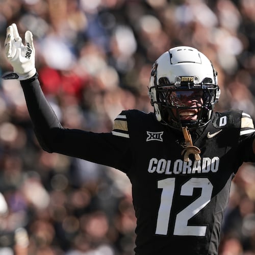 Colorado's Travis Hunter (12) celebrates a touchdown during the third quarter against Oklahoma State at Folsom Field on Nov. 29, 2024, in Boulder, Colorado. (Andrew Wevers/Getty Images/TNS)