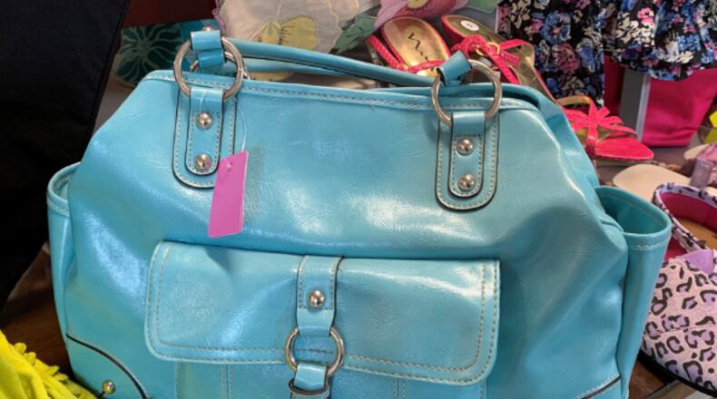 Shoppers can find designer clothing, accessories and and household goods at the Community Assistance Center Upscale Thrift Shop in Sandy Springs. (Courtesy Community Assistance Center)