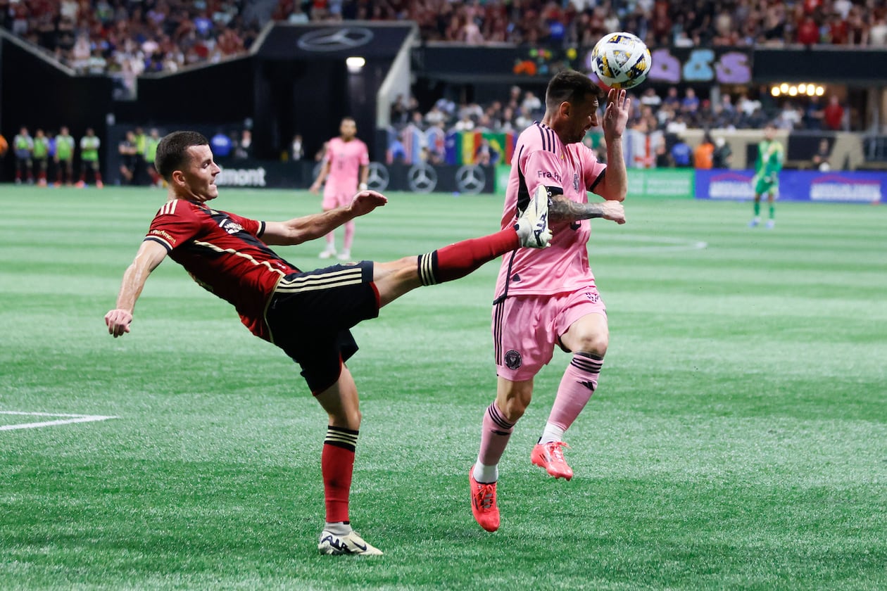 Atlanta United defender Brooks Lennon (11) rejects the ball away from Inter Miami forward Lionel Messi (10) during the second half at Mercedez Bens-Stadium. on Wednesday, September 18, 2024, in Atlanta.
(Miguel Martinez/ AJC)