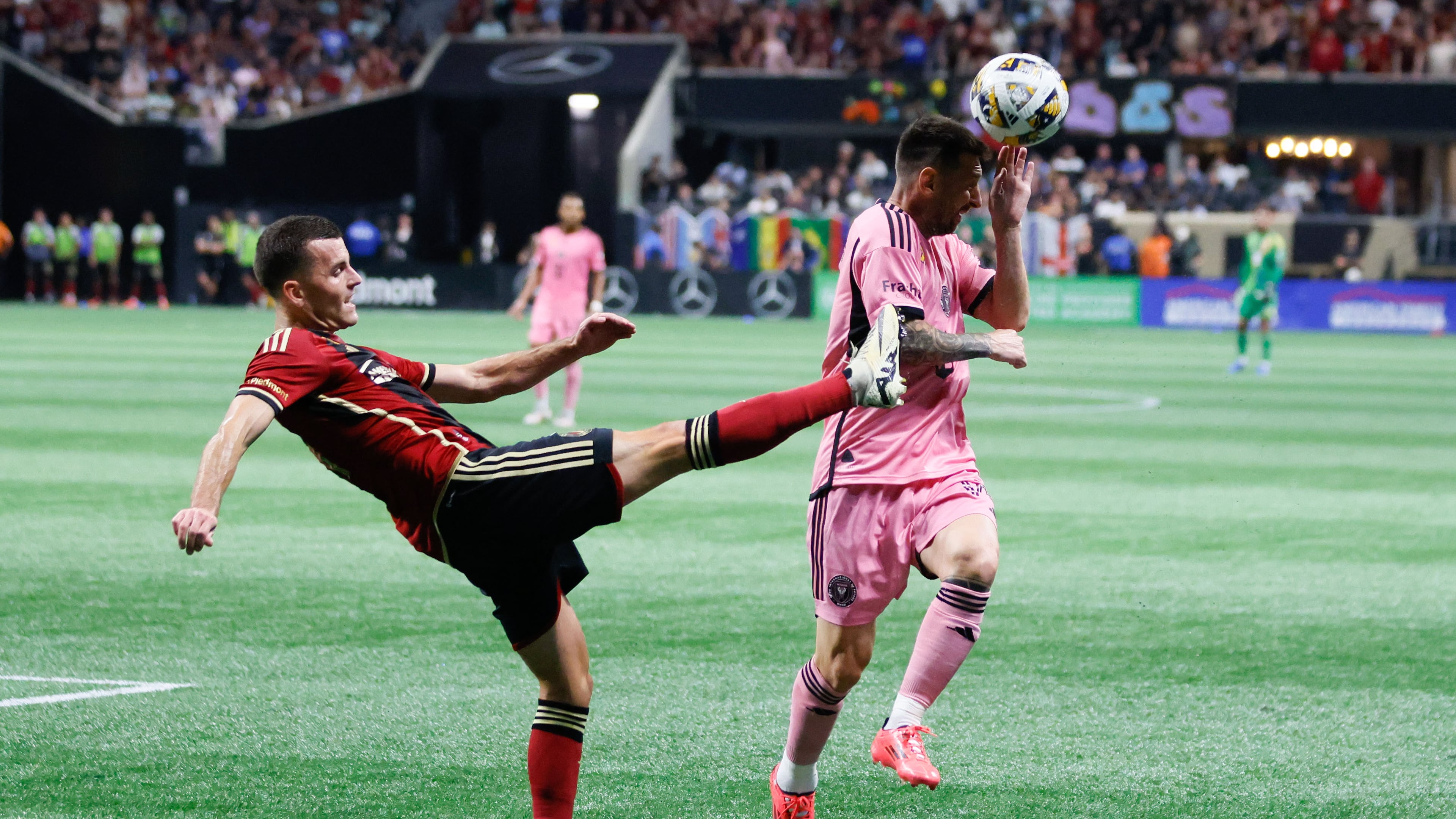 Atlanta United defender Brooks Lennon (11) rejects the ball away from Inter Miami forward Lionel Messi (10) during the second half at Mercedez Bens-Stadium. on Wednesday, September 18, 2024, in Atlanta.
(Miguel Martinez/ AJC)