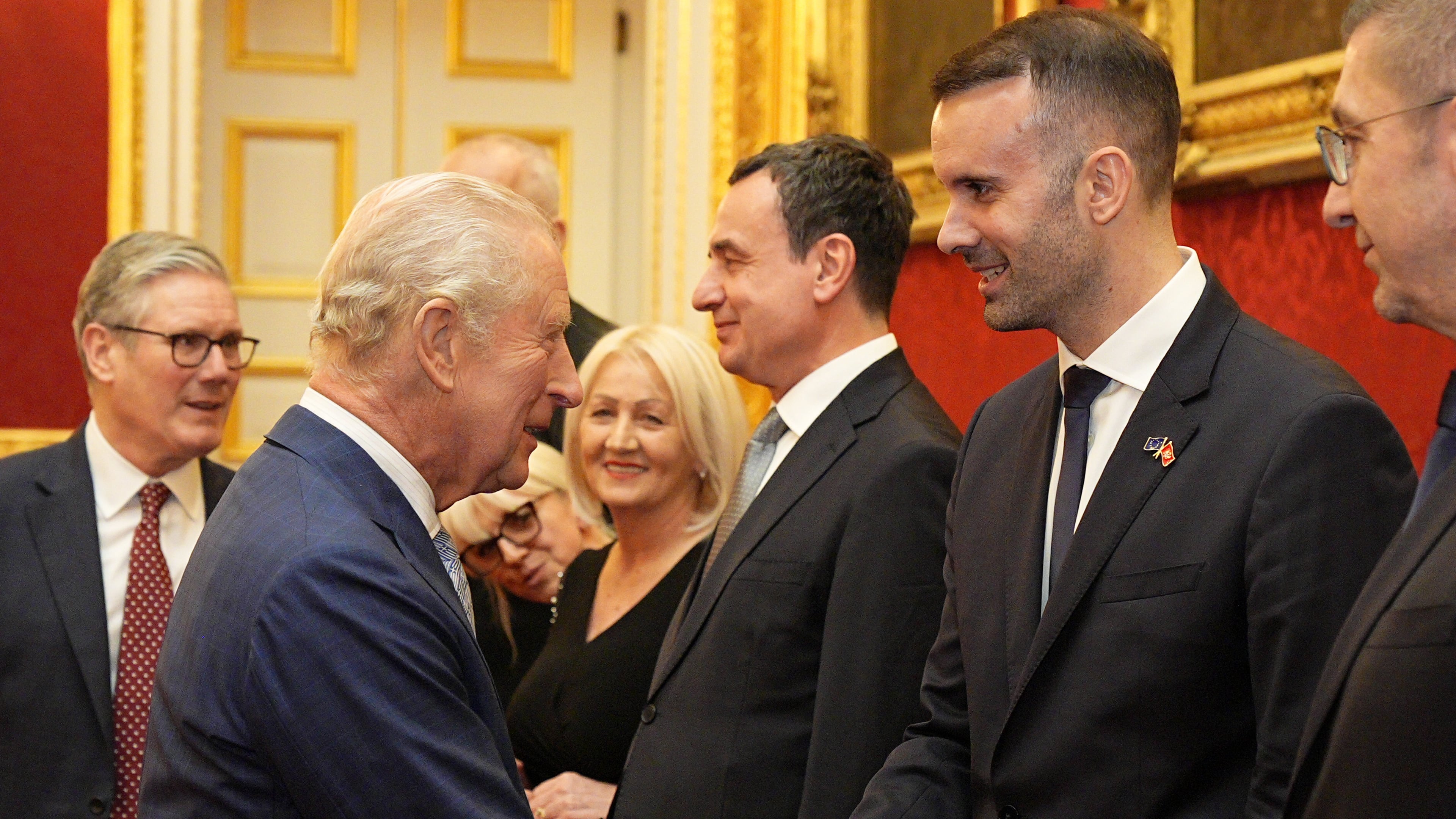 Britain's King Charles III greets the Prime Minister of Montenegro Milojko Spajic, during a reception for Western Balkans leaders at St James's Palace, London, Tuesday, Oct. 21, 2025, on the eve of the Western Balkans Leaders' Summit. (Aaron Chown/Pool Photo via AP)