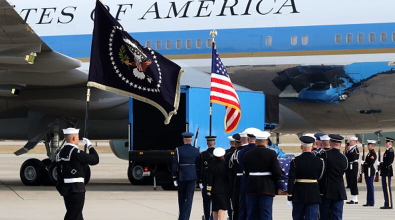 A U.S. military honor guard carries the casket of former U.S. President George H.W. Bush in 2018. Presidential funerals are carefully scripted affairs. Former President Jimmy Carter's events will take place in Plains and Atlanta, Georgia, and in Washington, D.C. (Photo by Mark Wilson/Getty Images)