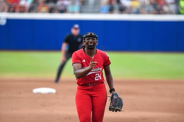 Texas pitcher NiJaree Canady celebrates after throwing a strikeout during the third game of the NCAA softball Women's College World Series finals against Texas in Oklahoma City, Friday, June 6, 2025. (AP Photo/Kyle Phillips)